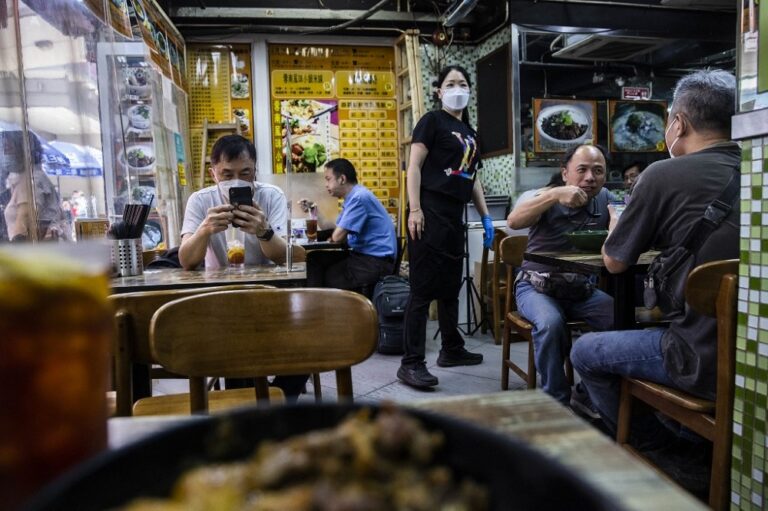 Hong Kong reopens venues, extends dining hours as Covid cases fall