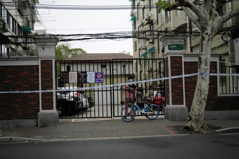 Shanghai fences up Covid-hit buildings, fuelling fresh outcry