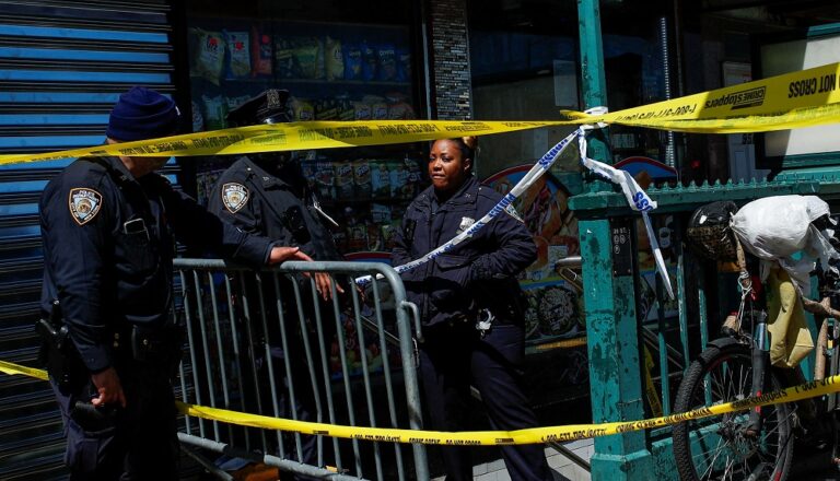 Manhunt under way for gunman in NYC subway shooting that injured at least 23