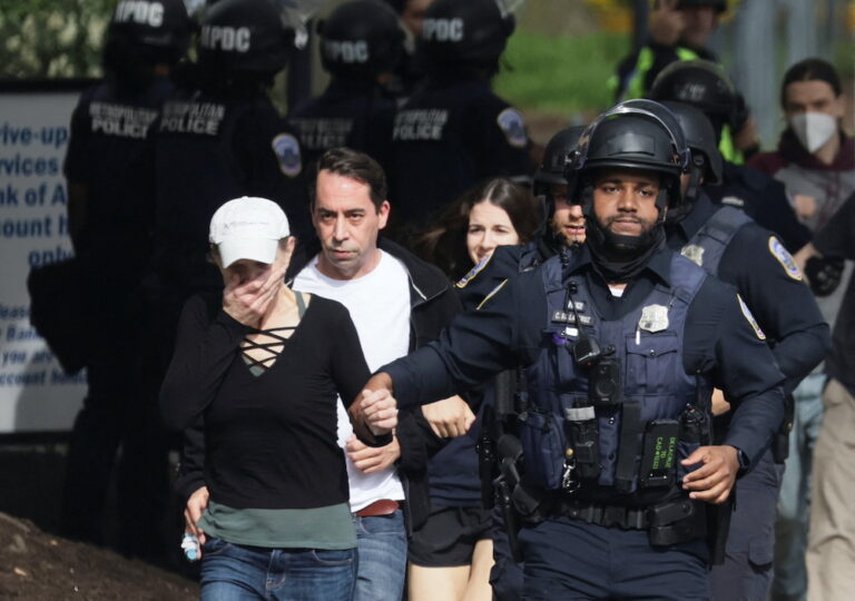 Washington police hunt for gunman who wounded 3 near elite prep school