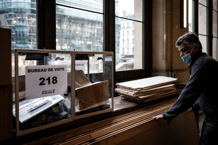France prepares for first round of tight Macron re-election bid