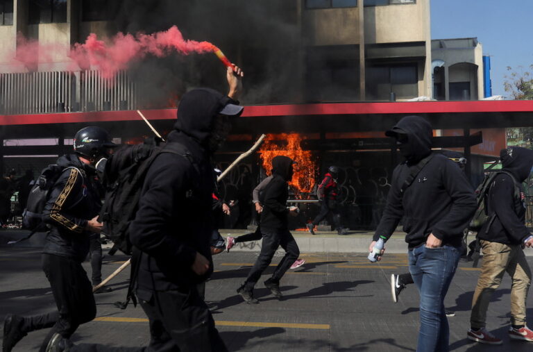 Three shot in Chile May Day clashes
