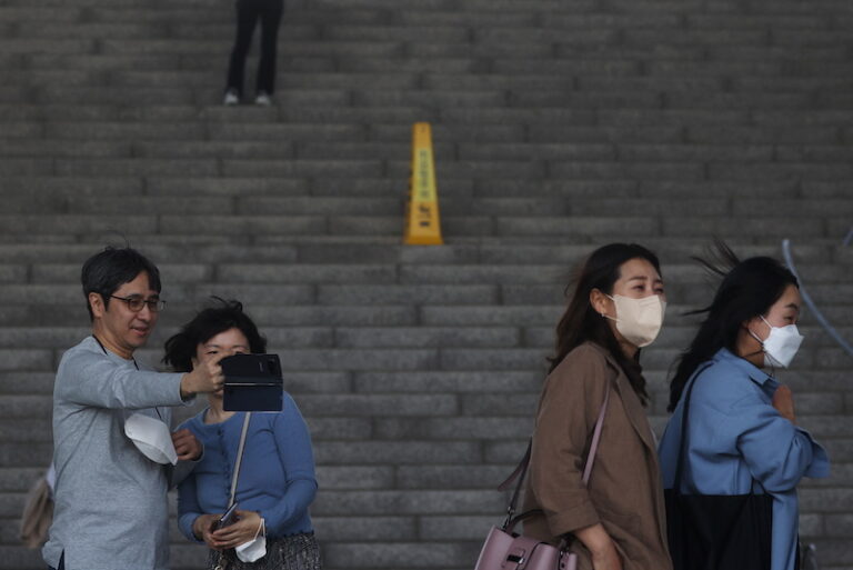 S.Korea drops outdoor mask rule but many prefer to keep them on