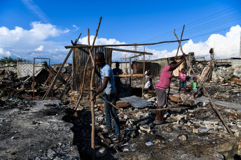Dozens killed in Haiti in two weeks of gun battles, thousands flee homes