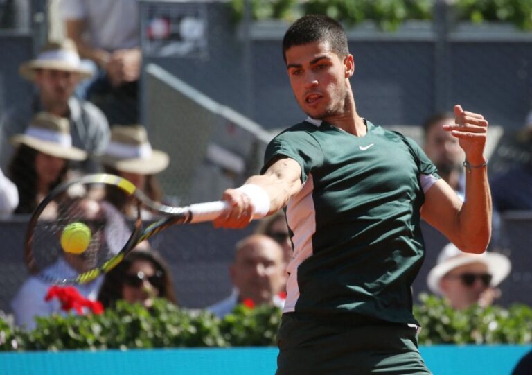 Alcaraz upsets idol Nadal to set up semi-final date with Djokovic in Madrid