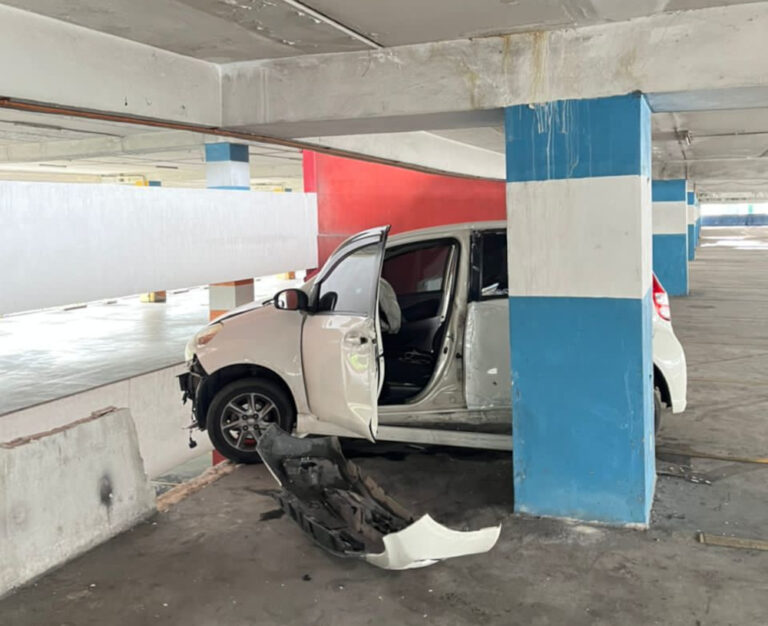 Seremban Fire and Rescue: Myvi crashes into high-rise parking wall, woman injured by falling debris