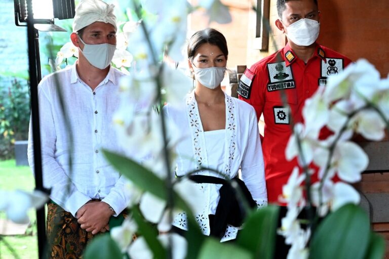 Bali to deport Russian couple for nude photos on sacred tree