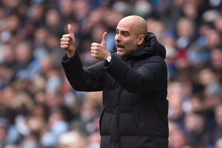 Guardiola urges Man City to seize title after dramatic West Ham draw