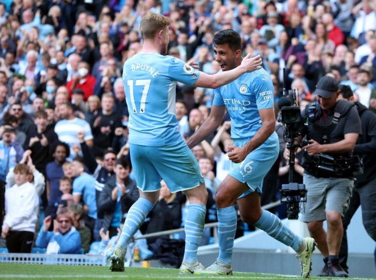 Man City eyes on Premier League prize as Leeds face the drop