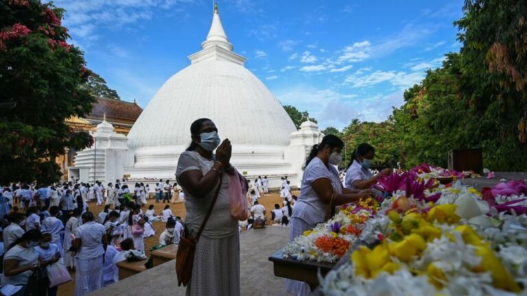 Crisis-hit Sri Lanka lifts curfew for Buddhist festival