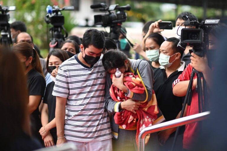 Day after Thai attack, traumatised relatives cling to slain children’s toys