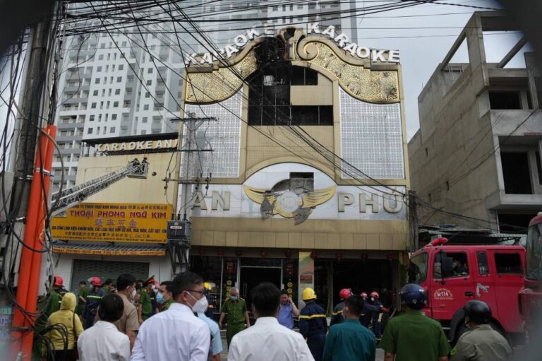 Two police officers arrested in Vietnam after blaze killed 32