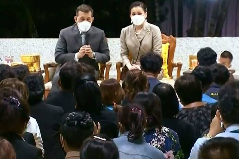 Thai king tells massacre victims’ families ‘I share your grief’