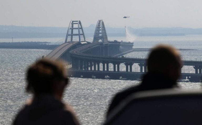 Explosion destroys part of Crimea bridge crucial to Russian war effort