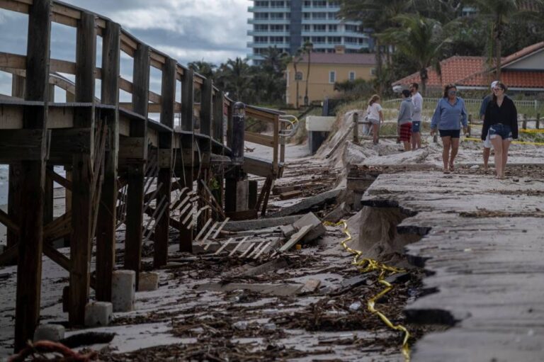 Tropical Storm Nicole lashes Florida, downing power lines and killing two