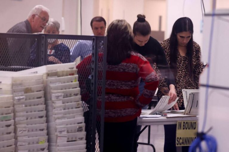 A nation waits: US election workers toil to count thousands of votes