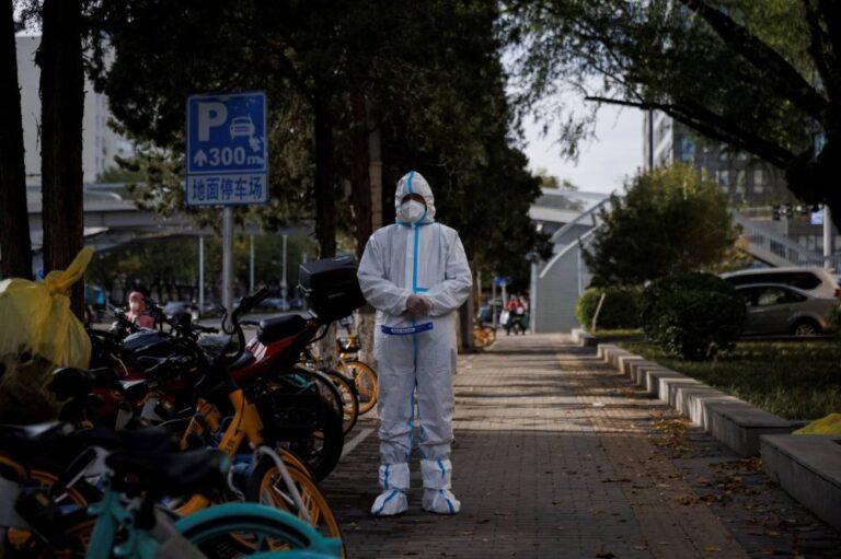 Chinese cities including Beijing report record Covid cases