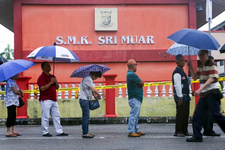 Johor polls open with clear skies across most areas, but heavy rain dampens Muar