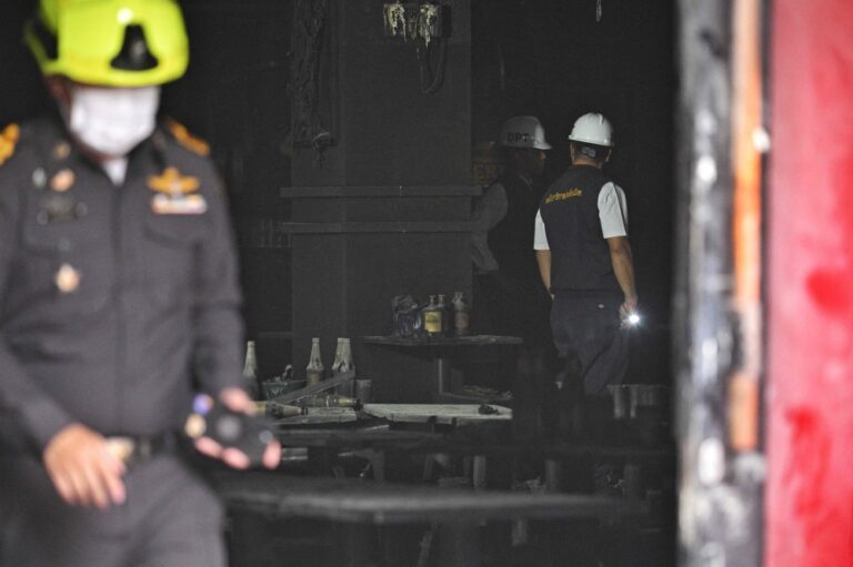 Investigators comb wreckage after Bangkok bar fire kills 27, injures 73