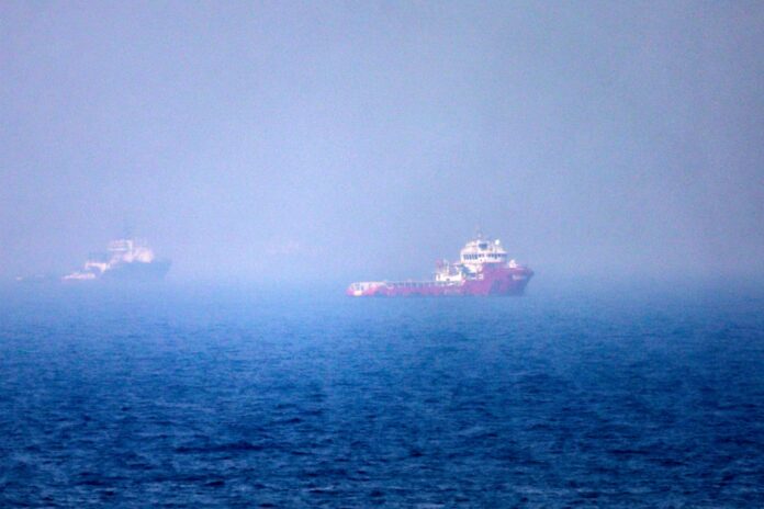 Vessel on fire in Strait of Hormuz as US and Iran vie for control