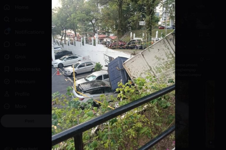 Rubbish lorry crashes through Pantai Hillpark condo wall, crushes three cars