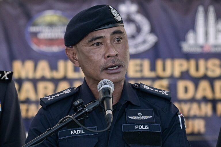 KL police say personal grudge behind petrol attack on woman at Kepong lottery outlet