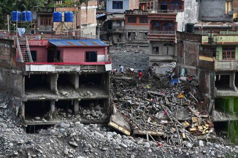 Two Nepal rescues revive hopes 10 days after flood