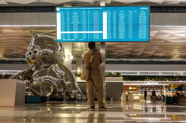 Indonesia reopens major airports after ash shutdown as stranded travellers welcome gradual return of flights