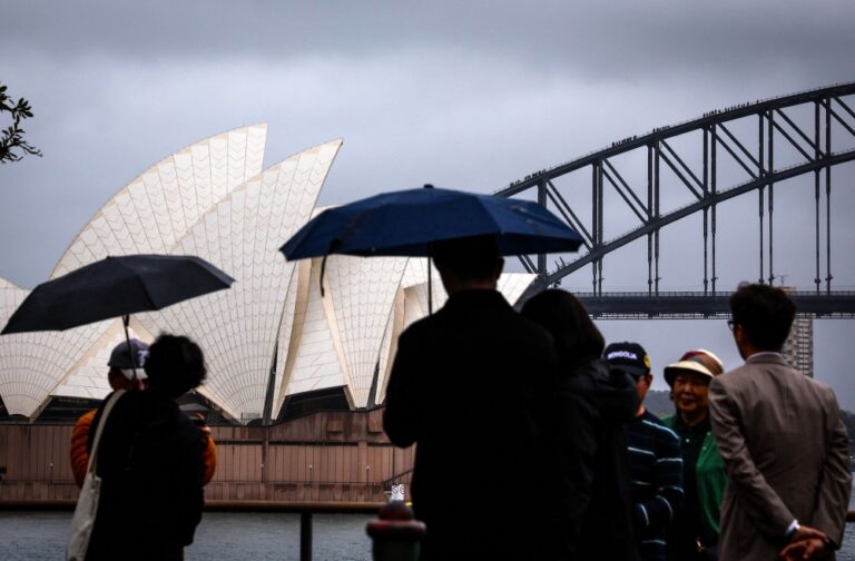 Australia to detain visa overstayers under new migration crackdown, drawing concern from tourism sector