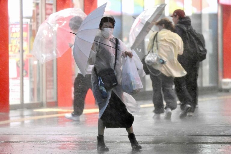 Typhoon Dujuan kills two, disrupts flights and triggers evacuation advisories in Japan
