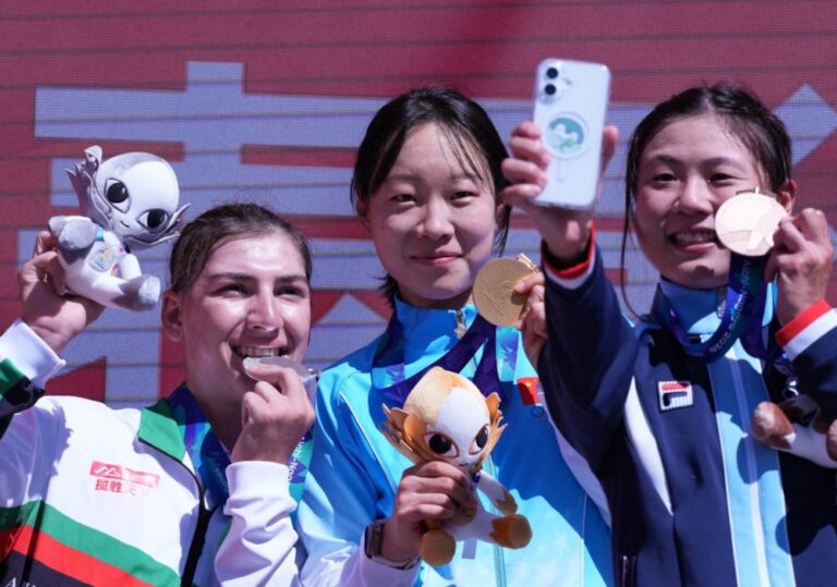 Afghan cyclist Hashimi wins Asian Games silver after training disguised as man