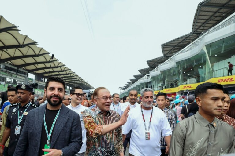 F1 fever builds as PM Anwar takes pit-lane walk at Sepang