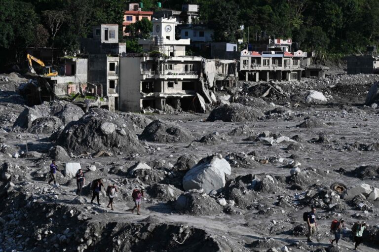 Safe return of solo Malaysian after 37 days in Nepal floods offers hope to 54 still missing